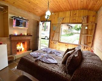 بوزادا أكونتشيجو - Monte Verde - غرفة نوم