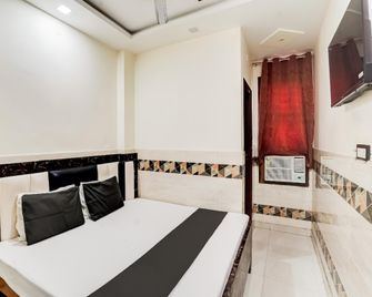 Hotel O Flagship R. D. Inn - Kanpur - Bedroom
