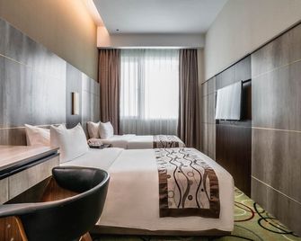 Ano Hotel - Miri - Slaapkamer