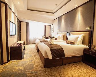 Xian heng Hotel - Shaoxing - Schlafzimmer
