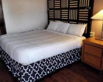 Tri-City Motel By OYO Forrest City Spindale - Spindale - Habitación