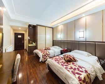 Qixiangju Hostel - Leshan - Habitación
