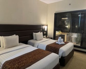 ذا بي سي سي هوتل آند ريزيدانس - باتام كوتا - غرفة نوم