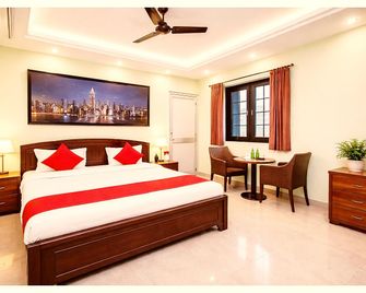 Goroomgo Somnath Rest House Puri - Near Sea Beach - Puri - Bedroom