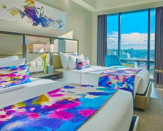 سافوي هوتل مانيلا نير نايا تيرمينال 3 منإل - مانيلا - غرفة نوم