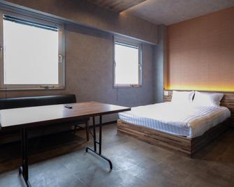 Ping Pong Hotel & Cabin Tokuyama Station Branch Pi - Shunan - Schlafzimmer