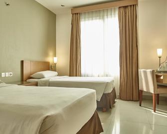 Triniti Hotel Jakarta - Jakarta - Soveværelse