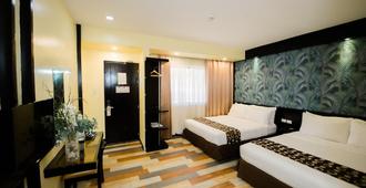 Sun City Suites - General Santos - Habitación