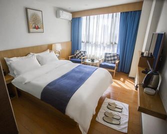Yishe Mingsu (Dongguan Hengli Branch) - Dongguan - Bedroom