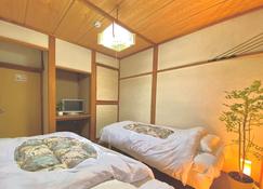 The Hotel Yuzawa Oriental / A Private Hotel With A - Yuzawa - Bedroom