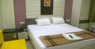 Hotel Darbar International - Gaya - Camera da letto