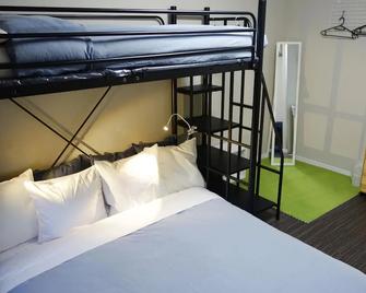 فوكوكا تابيجي هوستل - فوكوكا - غرفة نوم