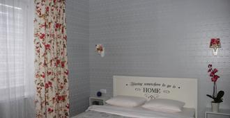 Lebediny Guest House - Brest - Bedroom