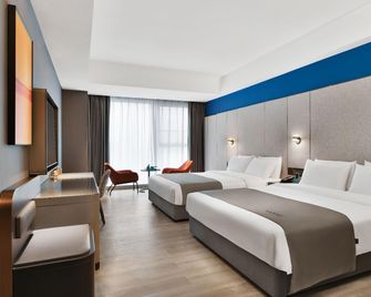 Lanou International Hotel, Antai Plaza, Rizhao University City - Rizhao - Ložnice