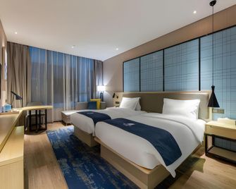 Echarm Hotel Wuhan Jianghan Road Walking Street - Wuhan - Bedroom