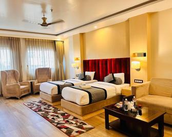 Hotel Holiday International - Purnea - Bedroom