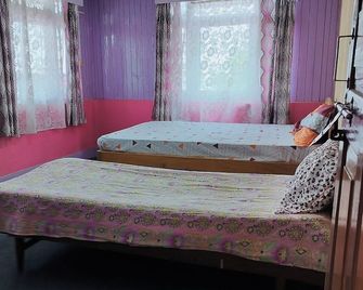 Tenkyong Homestay - Darjeeling - Bedroom