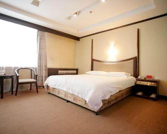 New-Mart Hotel - Mudanjiang - Habitación