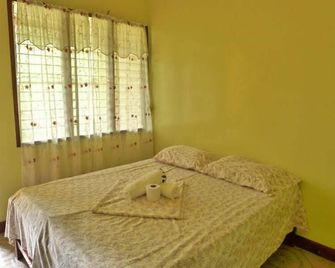 Elsa'S Cottage & Restaurant - San Vicente - Camera da letto