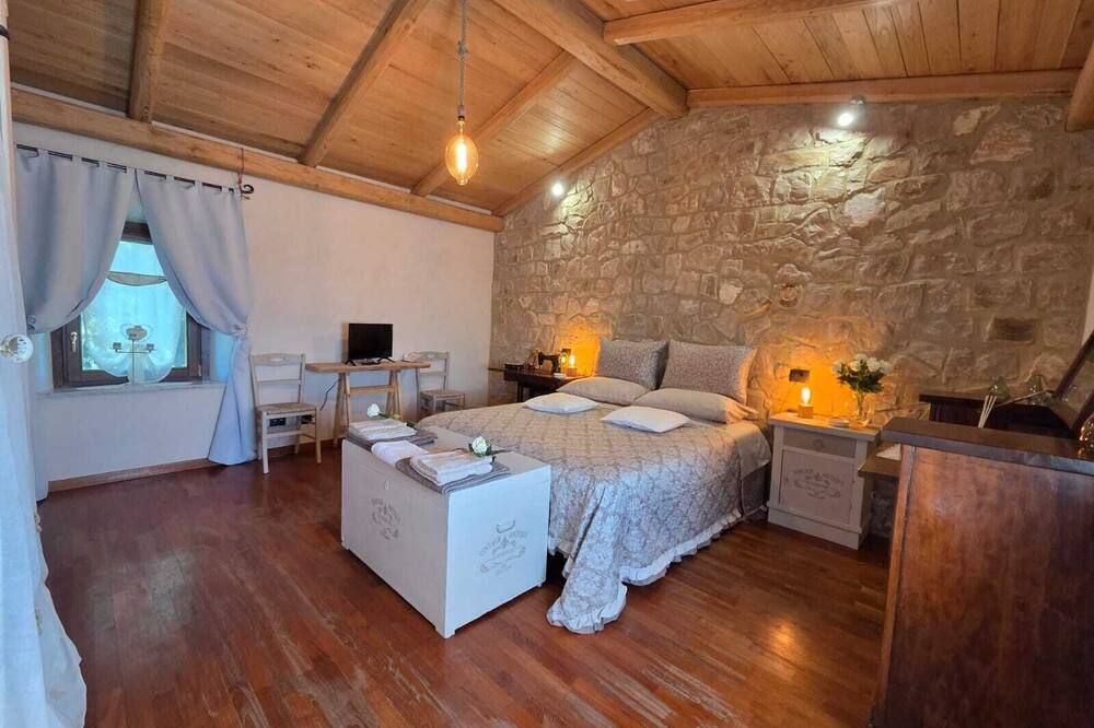 Tra gli ulivi e il panorama - אורבייטו - חדר שינה