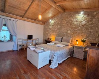 Tra gli ulivi e il panorama - אורבייטו - חדר שינה