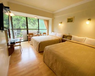 Ali-Shan Dengshan Hotel - Alishan Township - Bedroom