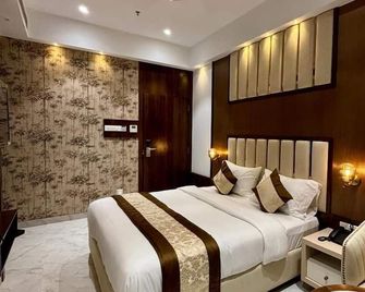 Hotel Sonesta Suites - Thane - Thane - Schlafzimmer