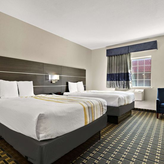 Bedroom view of SureStay Plus Hotel by Best Western Tulsa East