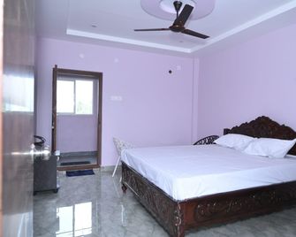 Sv Function Hall A/C And Non A/C Rooms - Rājahmundry - Schlafzimmer