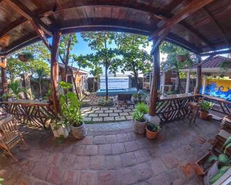 Romantic Beachfront Casita w/ Pool - AC - Sleeps 4 - Pochomil - Patio
