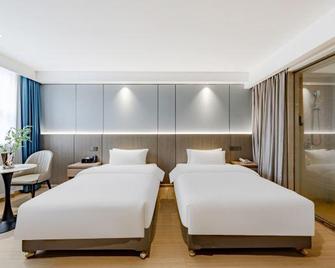 Wuhu Aoxin Business Hotel (Olympic Sports Center, Wuhu Ancient City Branch) - Wuhu - Soverom