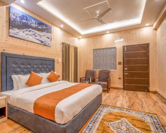 Tapovan Inn Hotel And Resort - Joshīmath - Bedroom