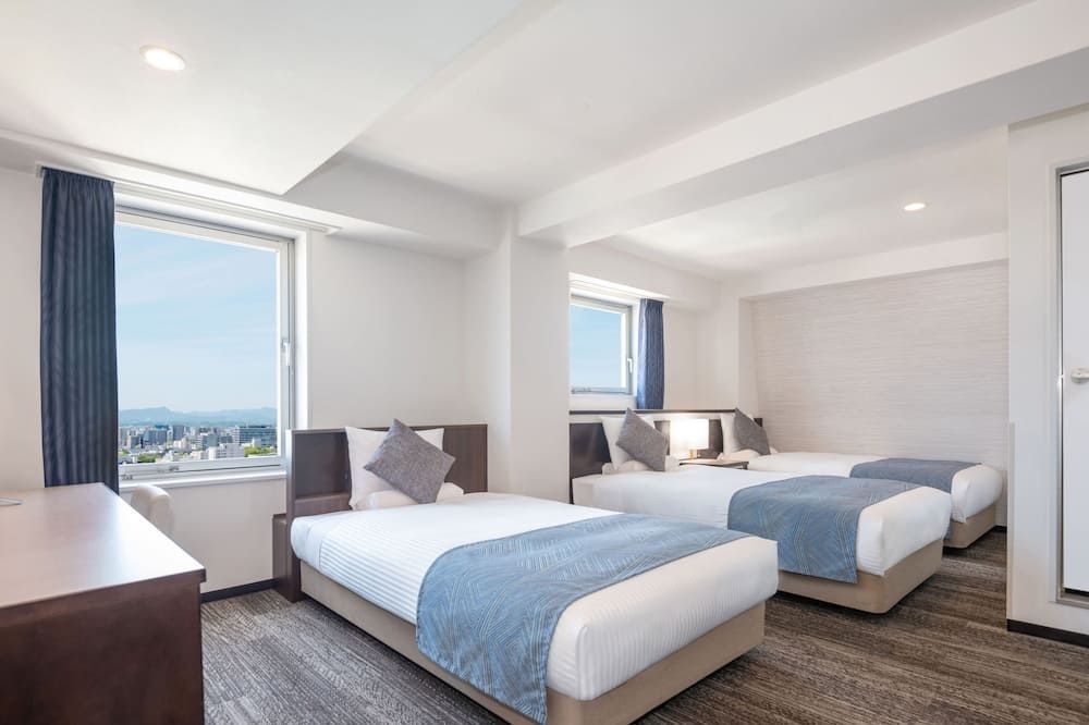 آرت هوتل ميازاكي سكاي تاور - ميازاكي - غرفة نوم