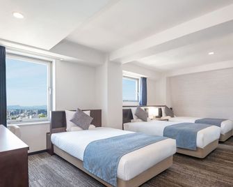 Art Hotel Miyazaki Sky Tower - Miyazaki - Schlafzimmer