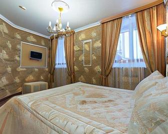 Hotel Uyut - Surgut - Bedroom