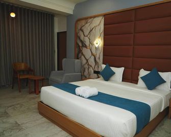 Hotel Leela's - Dwārka - Slaapkamer