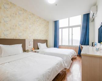7Days Inn Jiaozuo Renmin Road Branch - Jiaozuo - Спальня