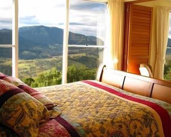 Spring Creek Mountain Cafe & Cottages - Killarney - Bedroom