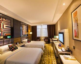 Yijia East Pinwei Hotel - Shangrao - Slaapkamer