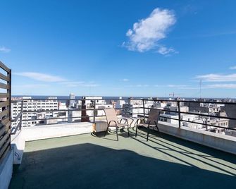 Penthouse Plaza Cagancha con Parrillero propio. - Montevideo - Balcony