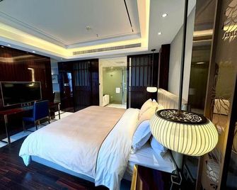 Aiport Apartment-stlye Hotel - Guiyang - Habitación