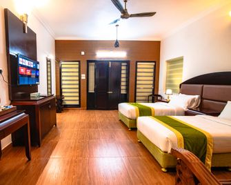 Clifinn Wellness Beach Resort by nutmeg - Thiruvananthapuram - Ruang tamu