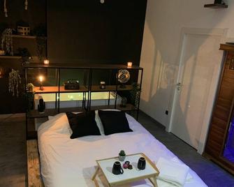 Appartement Spa - Nahleo Industriel - Dole - Bedroom