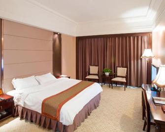 Chaozhou Shifeng Yingbin Inn - Chaozhou - Slaapkamer