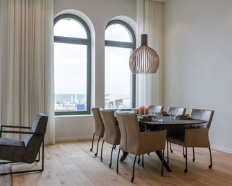 Huswell - Stunning seafront apartment with modern comforts and dike views - Ostende - Essbereich