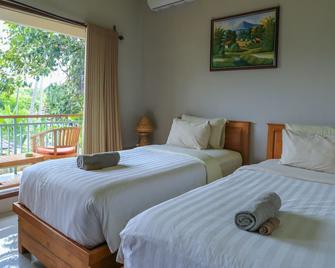 Senggigi Cottages Lombok - Матарам - Спальня