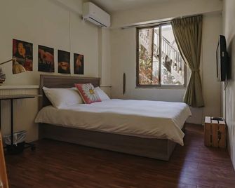 Mountain Traveler Inn - Ruifang District - Bedroom