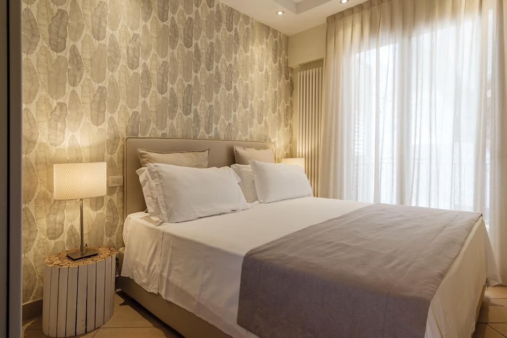 Residence Lungomare - Charming apartments - ريكسون - غرفة نوم