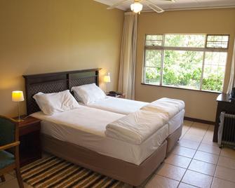 Emafini Country Lodge - Mbabane - Bedroom