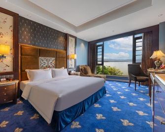 Xichang Qionghai Saibo Mansion Hotel - Liangshan - Schlafzimmer